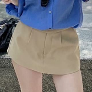 Long-Sleeve V-Neck Solid Blouse Paired with High-Waist Flared Mini Skirt