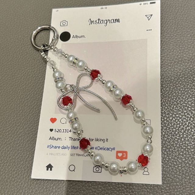 Bow Faux with Pearl Strap Pad Lanyard Phone