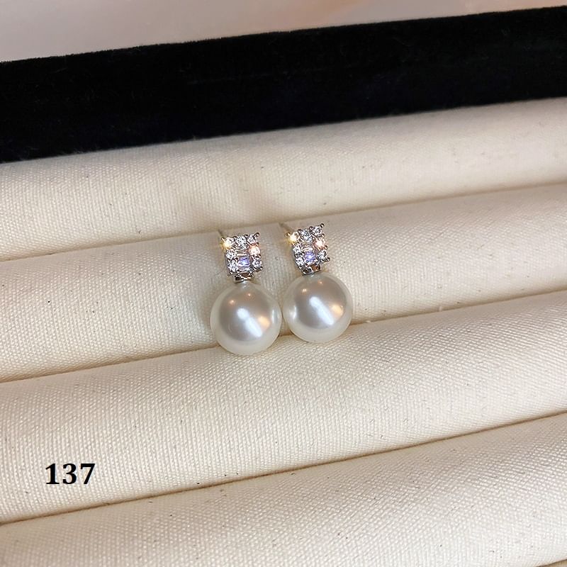 (Various Silver Tone Earring Designs)