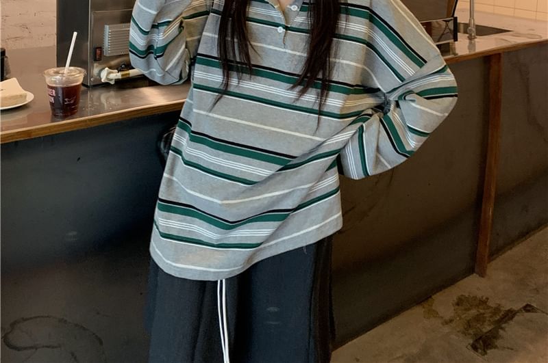 Striped Long-Sleeve Polo Paired with Cinched A-Line Skirt