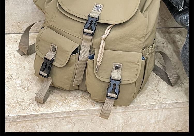 Embroidered Lettering Buckled Backpack Nylon Flap