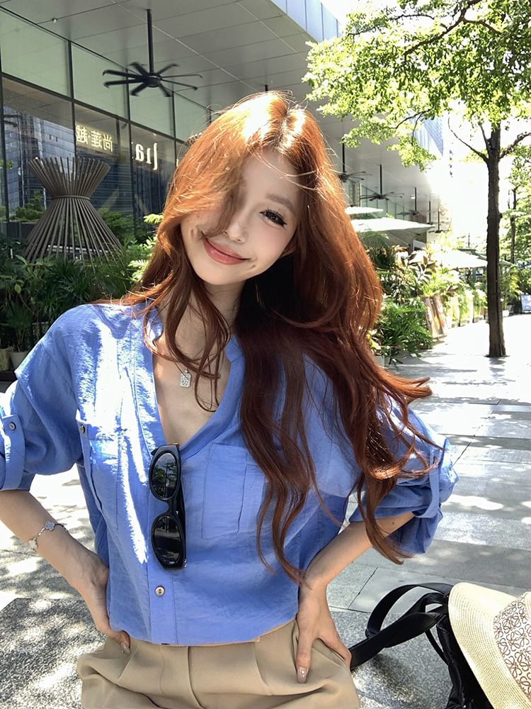 Long-Sleeve V-Neck Solid Blouse Paired with High-Waist Flared Mini Skirt