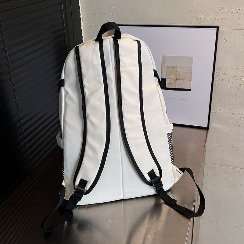 Two Backpack Tone Lettering