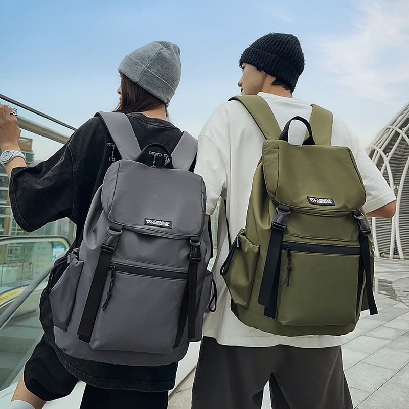 Backpack Buckled Flap Lettering