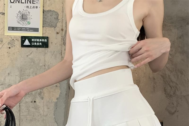 V-Neck Oversized Hoodie, High-Waist Mini Pleated Skirt & Scoop Neck Tank
