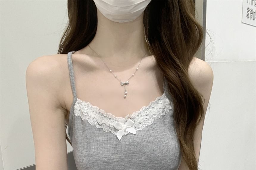 V-Neck Lace Trim Ruffle Hem Camisole Top
