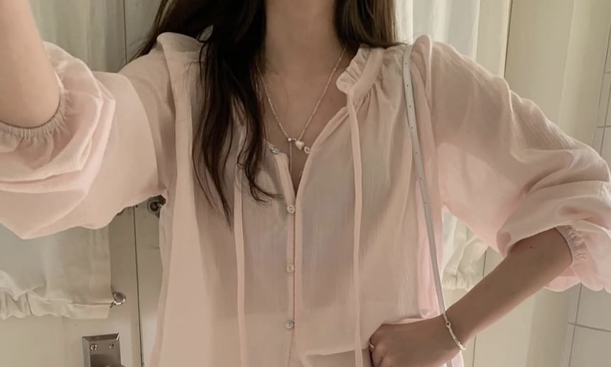 Ruffled Button-Up Blouse with Long Sleeves