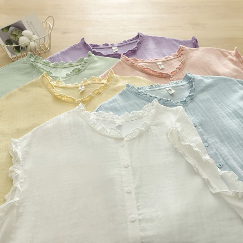 Ruffled Button Front Sleeveless Blouse