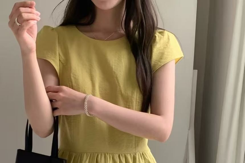 Asymmetric Peplum Blouse with Crew Neckline