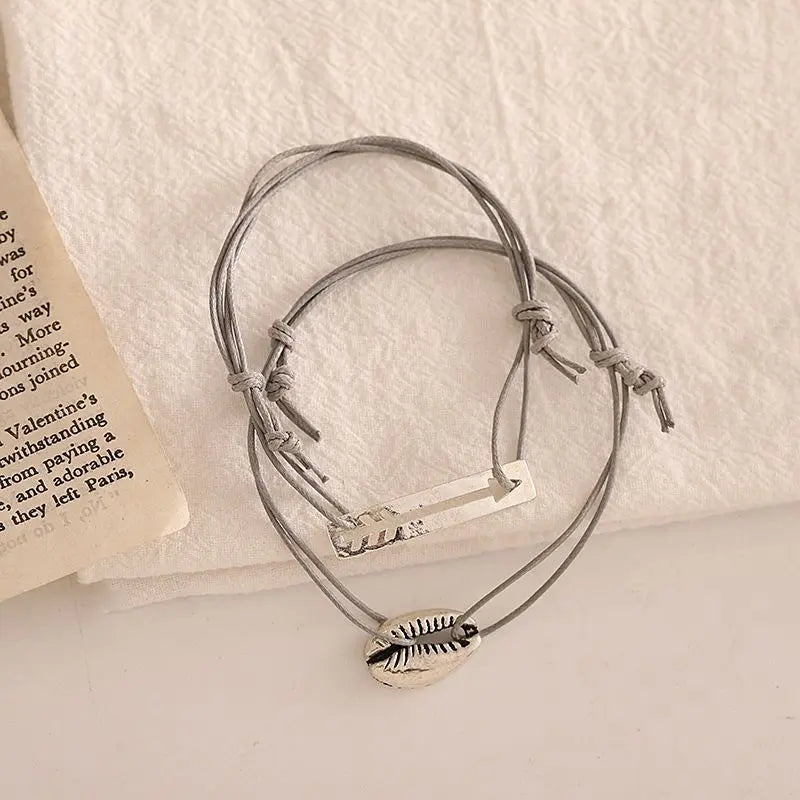 Lot de 2 : Bracelet à breloques en alliage GA90