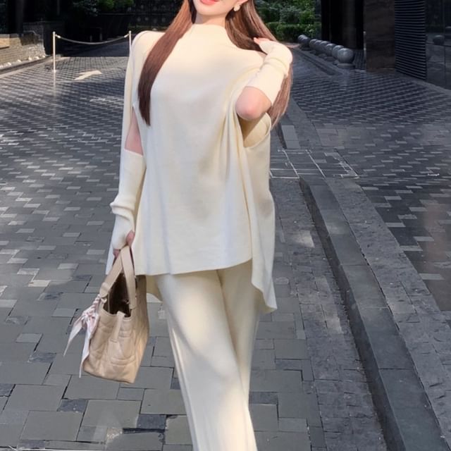 Mock Neck Cape Sweater with Flared Knit Pants and Arm Warmers