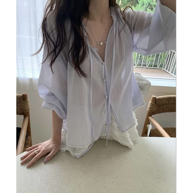 Ruffled Button-Up Blouse with Long Sleeves